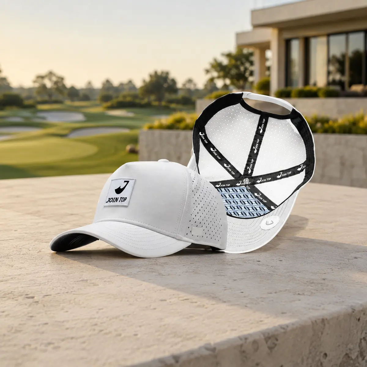 White structured JoinTop Performance Cap displayed at a golf course