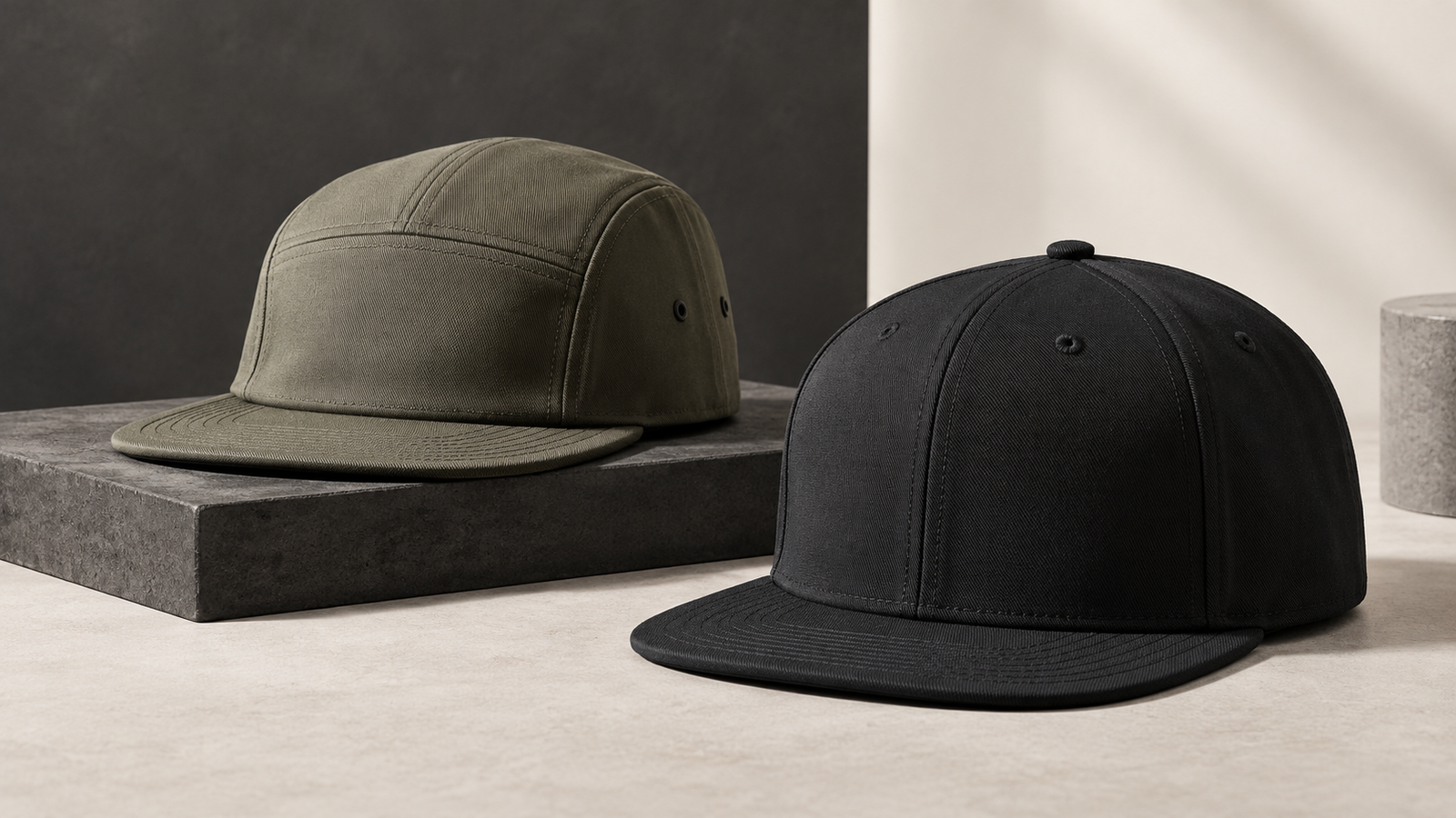 Two blank custom flat bill hats showing structured brim profiles